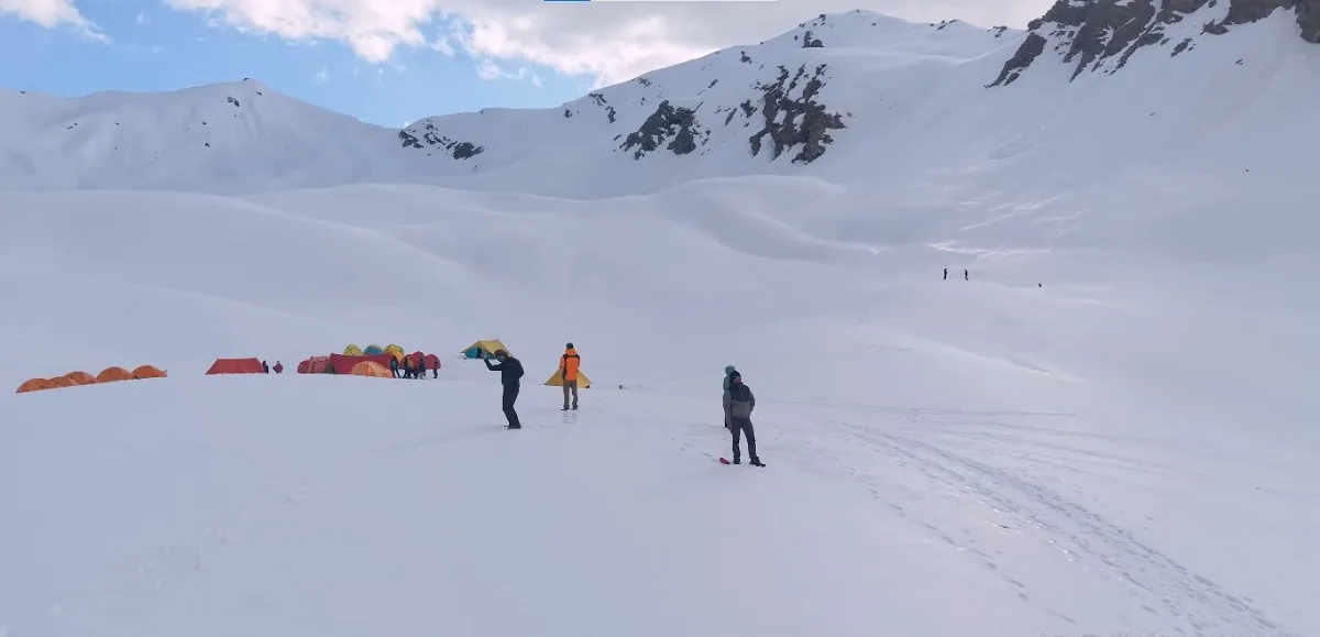 trekkers at a snowy high camp on the Bali Pass trek, a tough route for experienced trekkers