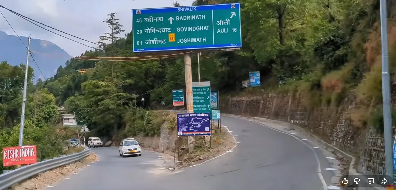 board showing the distance of badrinath from josimath