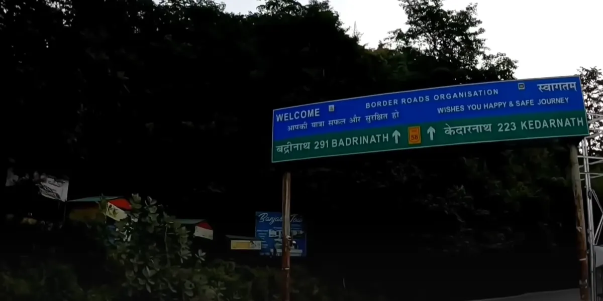 kedarnath distance board on road route to the temple