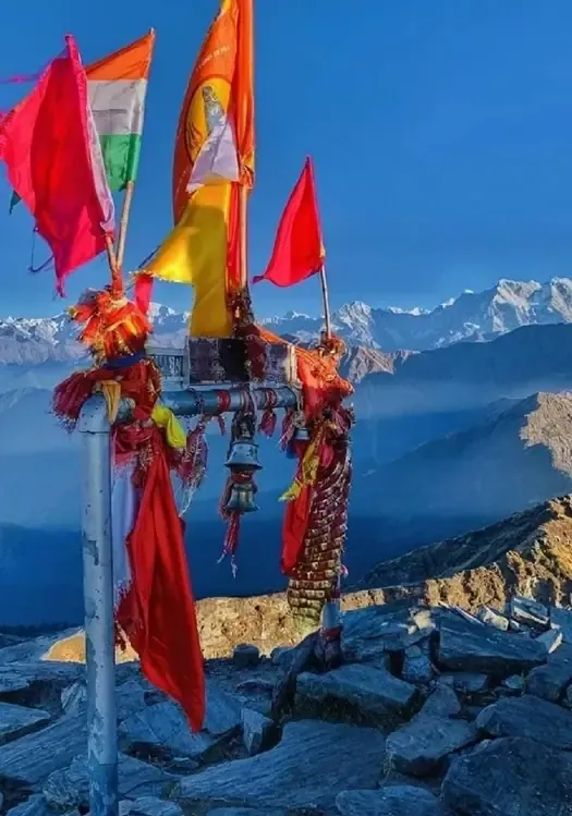 Prayer flags at the Chandrashila summit at sunrise