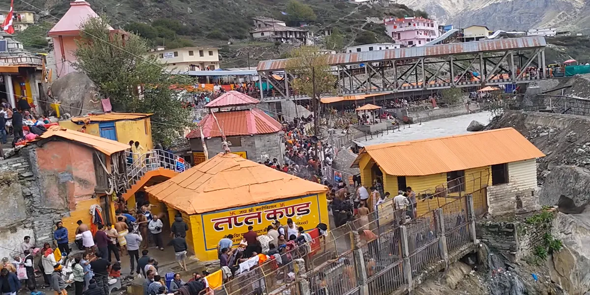 tapt kund near badrinath where pilgrims take holy bath in the natural hot water spring in uttarakhand