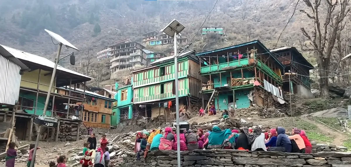 wooden houses and villagers in Malana village, Himachal Pradesh