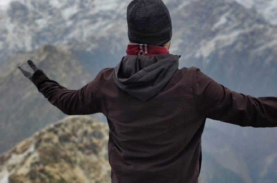 A man spreading arm at Chhota Tungnath trek.