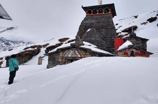 A view of chopta tungnath temple covered by snow