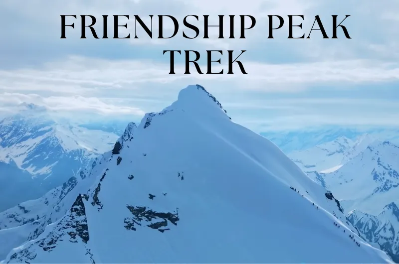 Friendship Peak trek Friendship Peak trek: a rope team climbing the snow-covered summit ridge of Friendship Peak (5,289 m) near Manali