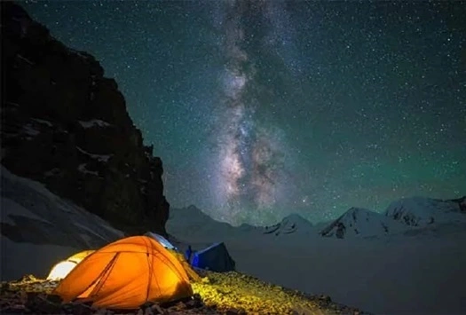 Camping view at night under the sky at the Kedarkantha Trek