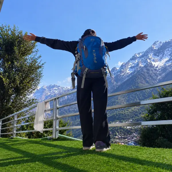 Traveller posing at Musafir Resort, one of the most premium stays in our Kedarnath package