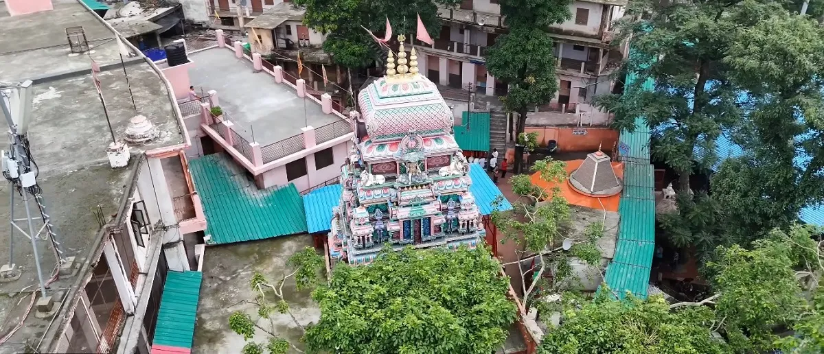 Aerial view of the Neelkanth Mahadev Temple among houses and trees in the hills near Rishikesh
