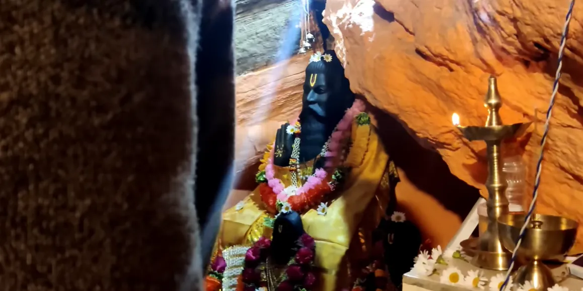 the inner look of ved vyas gufa with serene environment ideal for meditation with an idol of sage ved vyas